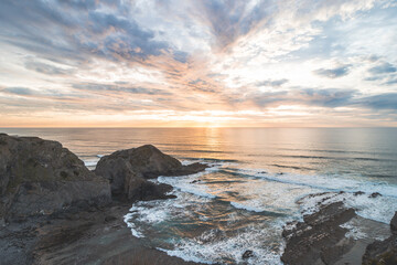 Coastline at Odeceixe at sunset plays with all the colors. Beauty of the Algarve region on the Atlantic coast of western Portugal. In the footsteps of the Fisherman trail. A dream tourist destination