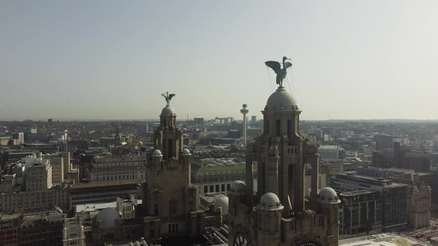 Aerial Drone Wipe showing Liver Building and Liverpool Cityscape 