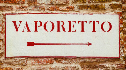 'Vaporetto' (venetian water bus) old road sign in Venice