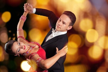 Couple of beautiful dancers dancing on stage