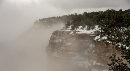 Snow Storm Clouds Block The Deep View Into The Grand Canyon