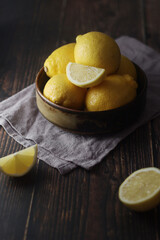 A bowl with yellow bright lemons