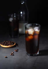 Cold coffee with ice in low key