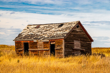 All that is left of an old house in the farmers feild. Three Hills, Alberta, Canada