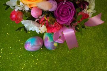 Happy easter! Flat Lay, Internet banner, postcard on Easter.  Bouquet of flowers and Easter eggs