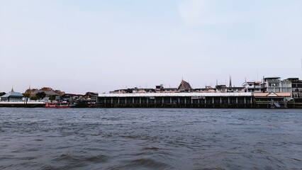 Naklejka premium boat on the river 