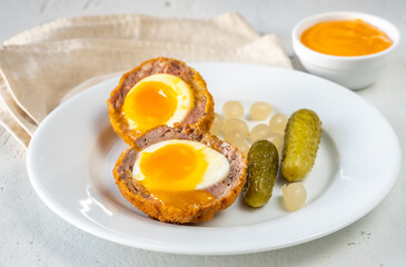 Portion of Scotch egg