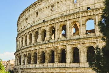 Fototapeta premium Section of, Roman Colosseum, against a clear, blue sky, in April