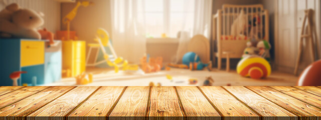 Empty wood table over blur background of childrens room with kid toys. Product display presentation