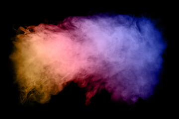 Colored powder explosion on black background. Freeze motion of colored powder explosion isolated.