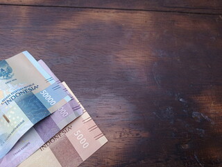 new and old Indonesian rupiah currency