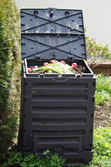 filled thermo composter in the garden