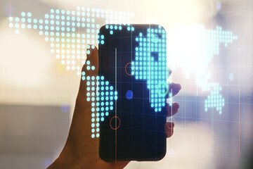 Abstract creative digital world map and hand with mobile phone on background, globalization concept. Multiexposure