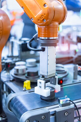 automatic gripping and smart robot working on smart factory,industry 4.0 and technology.