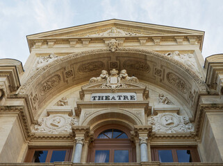 Obraz premium Decorations and monumental arch of entrance of Avignon theatre, France