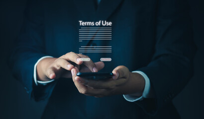 Terms of use business concept. Businessman Sign Terms of use and reading  terms and conditions of...