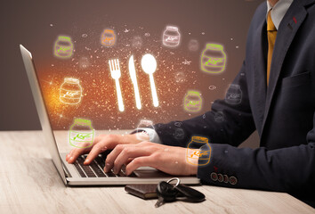 Hand searching for recipes on the internet