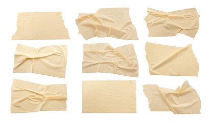 A set of crumpled strips of masking tape in various shapes and sizes. Masking tape isolated on...
