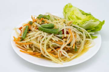 Thai Style Som Tum Papaya Salad on a White Plate