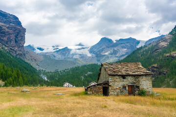 Fototapeta na wymiar Old farm house in the Ayes Valley, Aosta Valley, Italy
