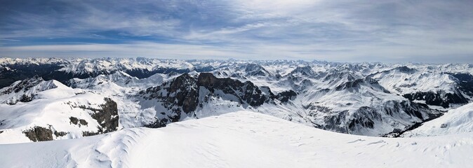 Mountain panorama from the Sulzfluh summit. Beautiful winter mountain panorama. Many peaks on the horizon. High quality photo