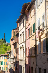 Fototapeta na wymiar Old medieval buildings in Siena city center, Tuscany, Italy