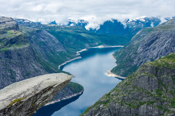 Naklejka na ściany i meble The amazing Trolltunga scenic spot, famous rock formation in Norway