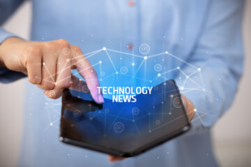 Businessman holding a foldable smartphone, new technology concept