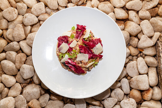 Italian risotto meal close up rock background