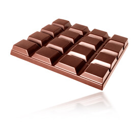 Bar of dark chocolate close up isolated on a white background