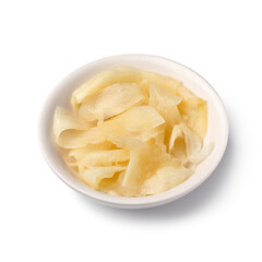 White bowl with pickled white Japanese sushi ginger close up isolated on white background