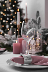 Fototapeta na wymiar Beautiful festive table setting with Christmas decor indoors
