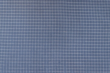 Fabric texture, blue in a white cage, background for card