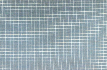 Fabric texture, blue in a white cage, background for card