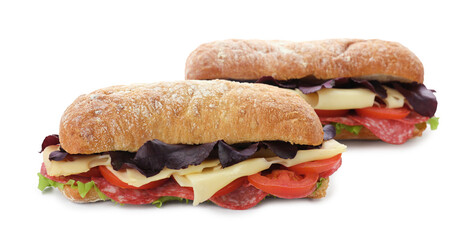 Delicious sandwiches with cheese, salami, tomato isolated on white