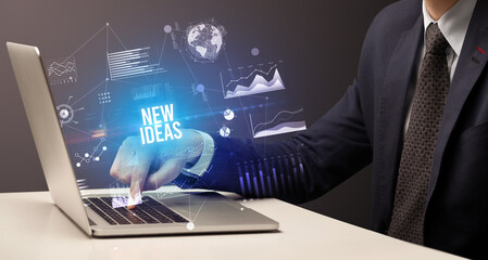 Businessman working on laptop, business concept