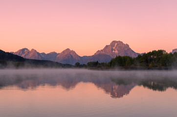 Beautiful Sunrise Landscape Reflection in the Tetons in Autumn