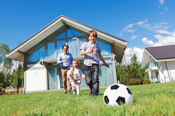 family playing football
