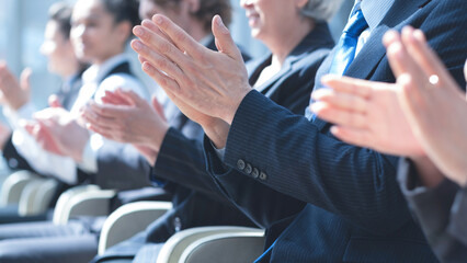 Business people applauding at meeting