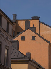 Fototapeta na wymiar Facades of old houses on the hill Maria Berget, a sunny day in Stockholm