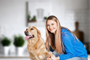 Happy young female with cute smart dog