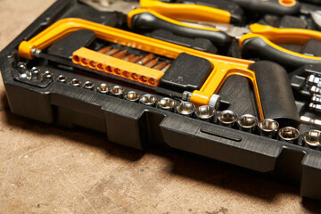 a set of different-sized heads close-up in a set of bench tools