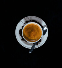 cup of coffee on black background