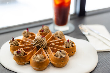 Waffle with hojicha cream on top