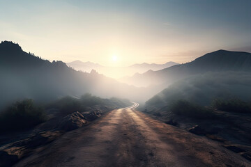 Foggy road in the mountains at sunset