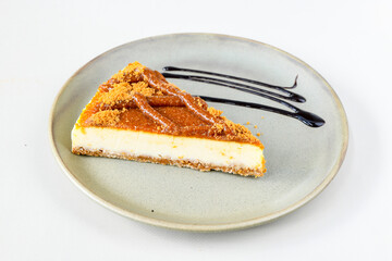 San sebastian ( Bask ) cheesecake slice isolated close up. Limon, lotus, fistikli, Frambuazli...