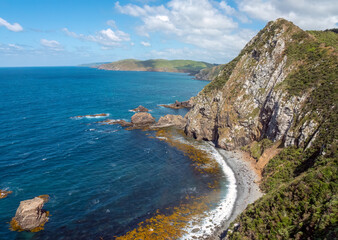 Nugget Point (Tokata). Iconic promontory on the Otago coast, the Catlins, South Island, New Zealand. Crowned by a lighthouse surrounded by rocky islets. 