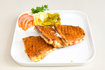 Turkish karisik atom Ayvalik tost ( kasarli bazlama tost) . Sucuklu, Kasarli, kavurmali karisik tost. Flat baked bread toasted