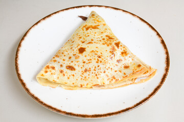 Freshly baked appetizing Turkish tortillas - Gozleme with spinach, cheese  on a wooden board. Space for text. Shallow depth of  field. Handmade Turkish traditional pastries.
