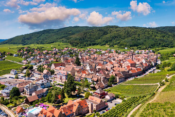View of Riquewihr village and vineyards on Alsatian Wine Route, France. Most beautiful villages of France, Riquewihr in Alsace, famous 